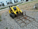 Shoveling Coal Mines Mini Skid Steer Loader With Leveler Attachment for sale