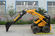 Garden Mini Skid Steer Loader ,360 Degree Steering Digger Wheel Loader supplier